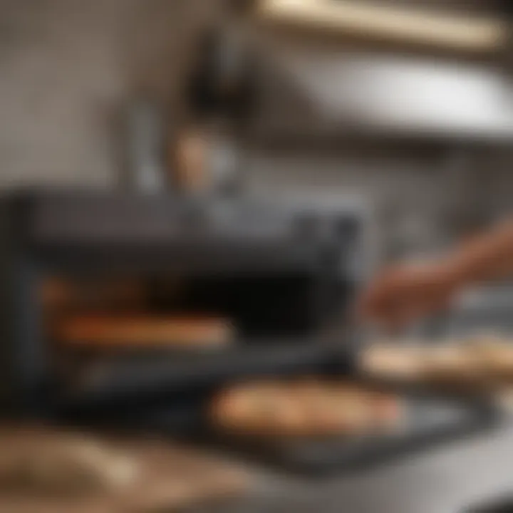 User engaging with the Camp Chef Griddle Pizza Oven