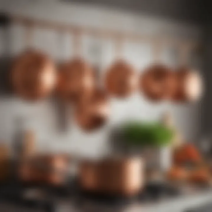 Variety of copper cookware hanging in kitchen