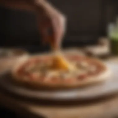 Dough being shaped into a pizza base on a wooden surface