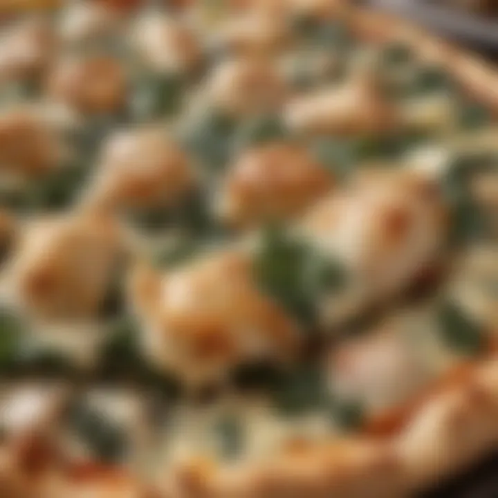 A close-up view of a freshly baked Chicken Florentine pizza topped with spinach and cheese