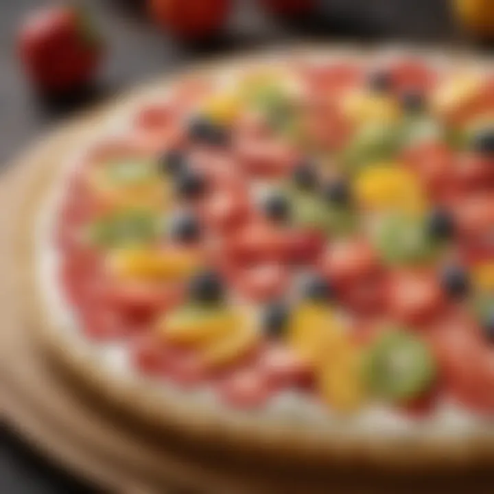 Close-up of creamy icing spread on fruit pizza