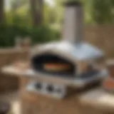 A Cuisinart Grill Top Pizza Oven in an outdoor kitchen setting