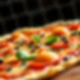 A close-up view of a perfectly baked thin pizza with fresh toppings