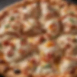 A close-up of a keto chicken bacon ranch pizza showcasing its toppings.