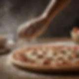 Wooden pizza peel being gently sprinkled with flour