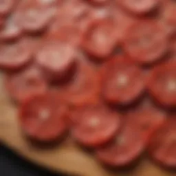 Pepperoni slices on a cutting board