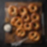 Artisan-style soft pretzels arranged elegantly on a wooden board