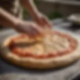 Artisanal pizza dough being hand-stretched