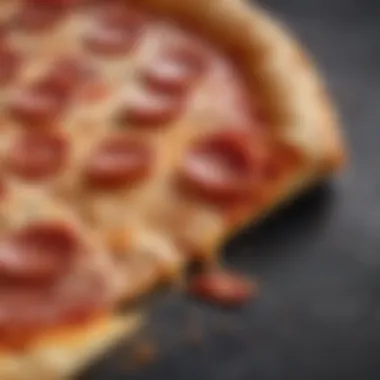 Close-Up of Pepperoni Pizza Slice A close-up of a pizza slice revealing the texture and flavor of pepperoni.