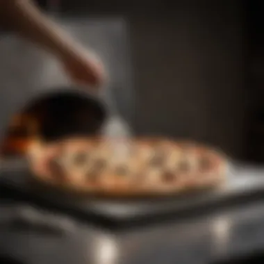 Durable Stainless Steel Pizza Peel A stainless steel pizza peel reflecting light, emphasizing its durability