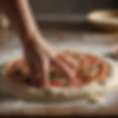 Homemade pizza dough being stretched on a floured surface